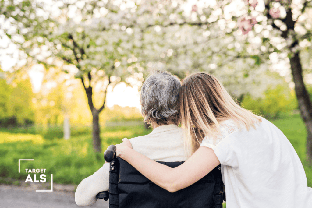 ALS in the Elderly: Recognizing ALS in Seniors; a young person hugs an elderly person in a wheel chair